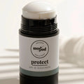 Portable zinc sunscreen SPF 30 in a small container, ideal for on-the-go use, featuring natural hydrating ingredients suitable for sensitive skin